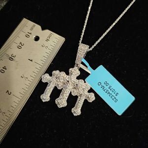 2.75CTW VVSD Moissanite Triple Cross Pendant on 20" chain in .925 silver